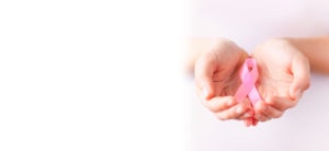 hands-holding-pink-ribbon-image